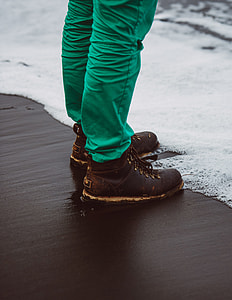 photo of person standing seashore thumbnail