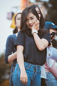 woman wearing black button-up blouse thumbnail