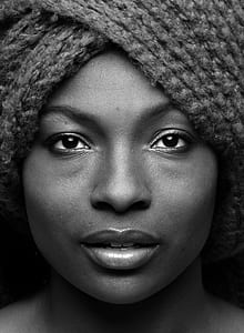 grayscale photography of woman wearing headdress thumbnail