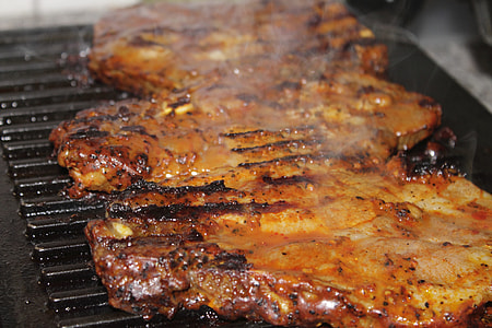 steak on top of grill thumbnail