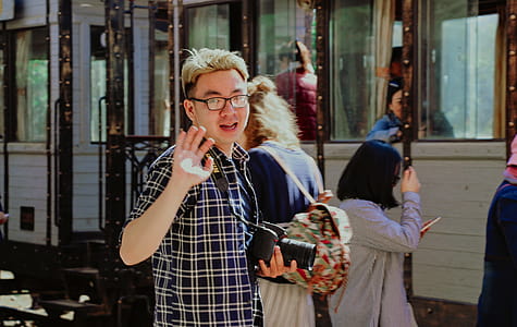 Man With Bridge Camera Waving thumbnail