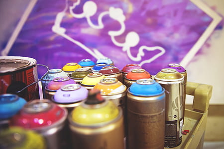 paint spray can on brown wooden rack thumbnail