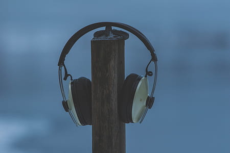 headphones on wooden post thumbnail