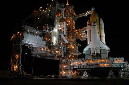 white and brown space rocket during day time thumbnail