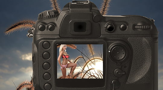 black DSLR Camera thumbnail