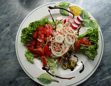 vegetable salad on white ceramic plate thumbnail