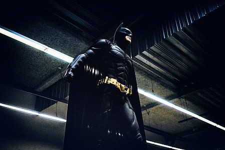 Batman standing inside building thumbnail