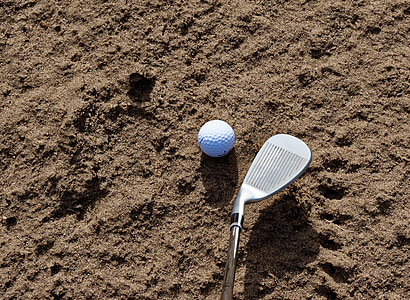 silver golf club beside golf ball thumbnail