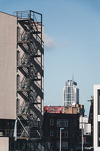 landscape photography of staircase beside building thumbnail