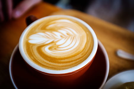 cappuccino with leaf art thumbnail