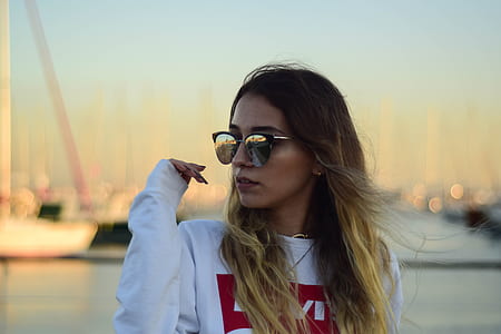 woman wearing white long-sleeved shirt thumbnail