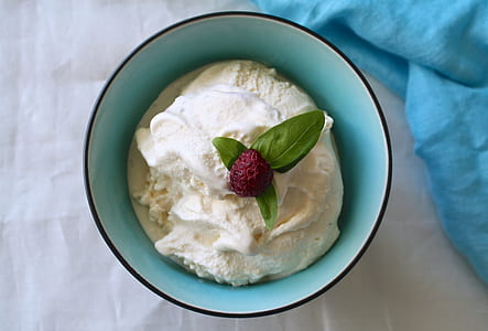 white cream on ceramic bowl with pink fruit thumbnail