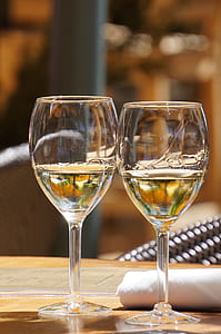 two wine glasses on table thumbnail