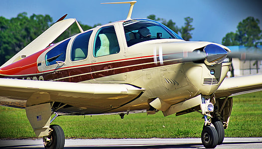 white and red monoplane thumbnail