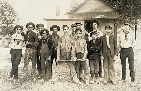 boys standing holding guns photo thumbnail