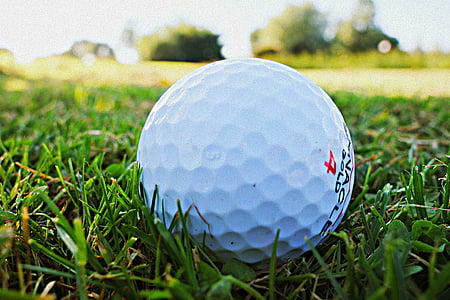 golf ball on green grass thumbnail