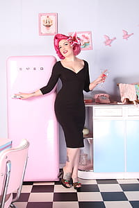 Woman Beside Refrigerator thumbnail