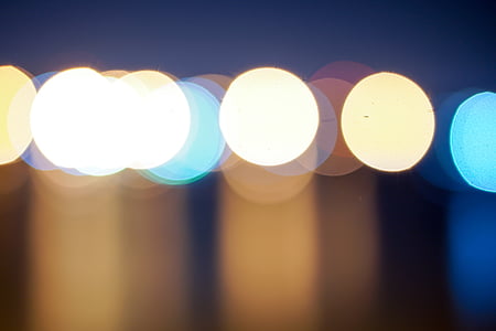 bokeh photography of white, yellow, and blue lights thumbnail