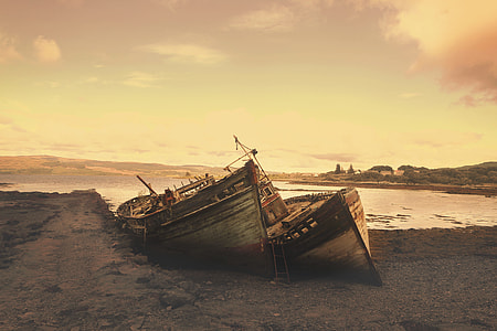 brown boat on shore thumbnail