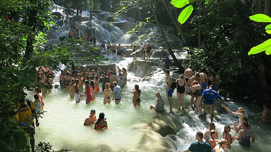 crowded people gathered on water spring during daytime thumbnail