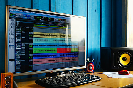 focus photography of monitor with digital mixer display thumbnail