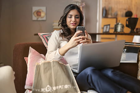 Photo of a Woman Using Her Smartphone thumbnail