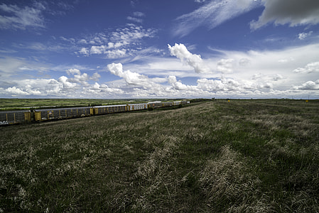 Train and landscape under the Beautiful Skies in Saskachewan thumbnail