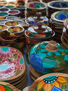 assorted-color floral wooden container lot at daytime thumbnail