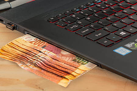 black laptop computer on top of table thumbnail