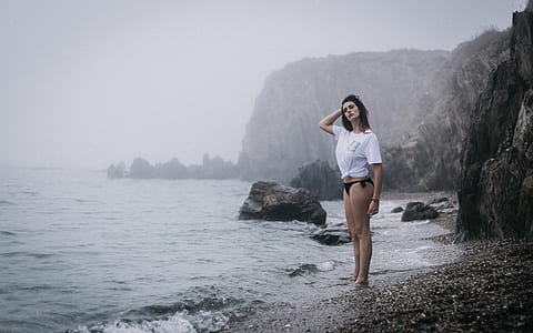 rules of thirds photography of woman near body of water thumbnail