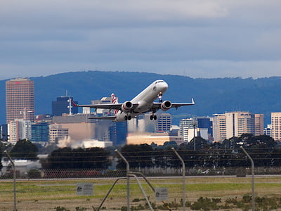 gray airplane lifting off thumbnail