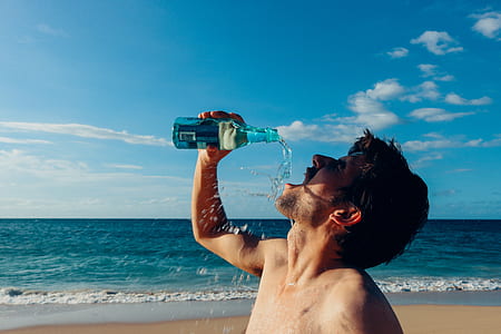 time lapse photography of man drinking beverage thumbnail