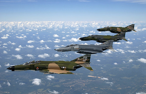 four fighter jets on mid air thumbnail
