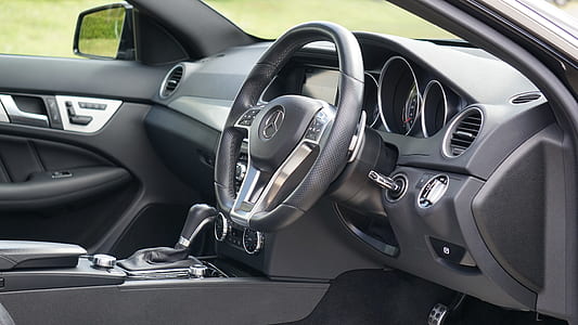 black automotive steering wheel thumbnail