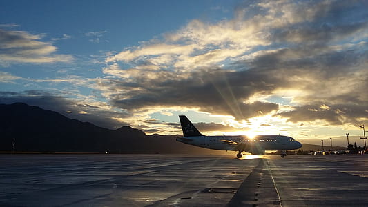 Silhouette of Airplane in Golden Hour thumbnail