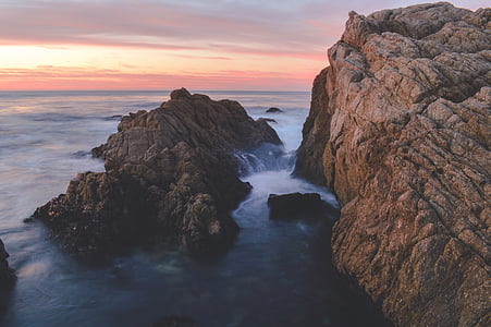 cliff at cloudy sky during daytime thumbnail