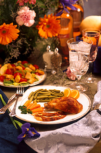 shallow focus photography of chicken dish with sliced vegetables and fruits thumbnail