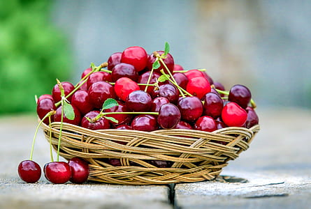 red cherry on brown wicker basket thumbnail
