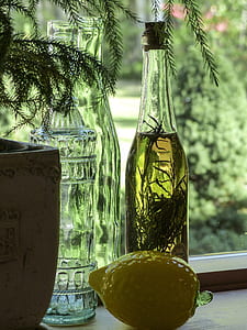 clear glass bottle with liquid thumbnail