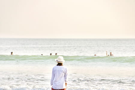 woman standing in front of sea thumbnail
