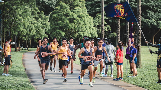 group of people running on raod thumbnail