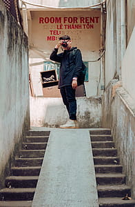 Man Standing At the Middle Of Pathway thumbnail