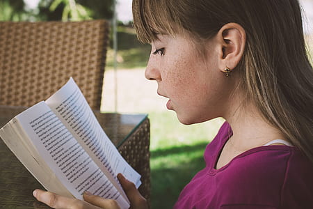 photo of woman reading book thumbnail