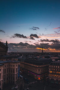 Paris building under blue and gray sky at daytime thumbnail