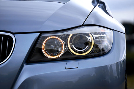 silver BMW projector headlight thumbnail