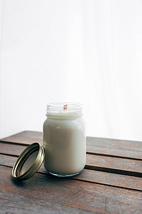 Mason jar of white liquid thumbnail