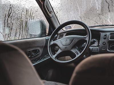 person taking photo of car interior thumbnail