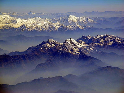 birds eye view of mountain covered with snow thumbnail