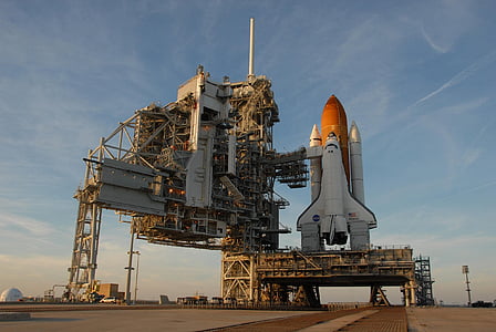 white and orange spaceship during daytime photo thumbnail