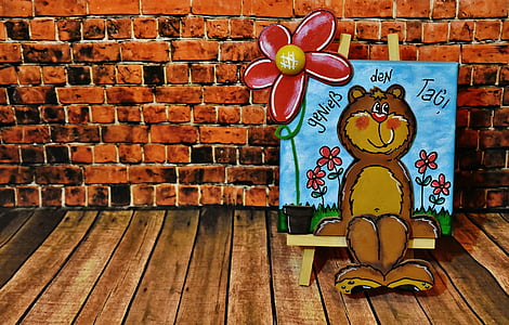brown bear painting beside wall thumbnail